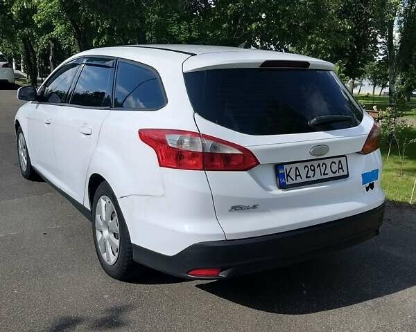 Білий Форд Фокус, об'ємом двигуна 1.59 л та пробігом 288 тис. км за 6001 $, фото 22 на Automoto.ua