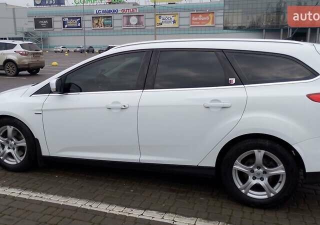 Белый Форд Фокус, объемом двигателя 2 л и пробегом 325 тыс. км за 6999 $, фото 3 на Automoto.ua
