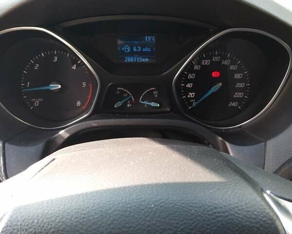 Білий Форд Фокус, об'ємом двигуна 1.59 л та пробігом 288 тис. км за 6001 $, фото 13 на Automoto.ua