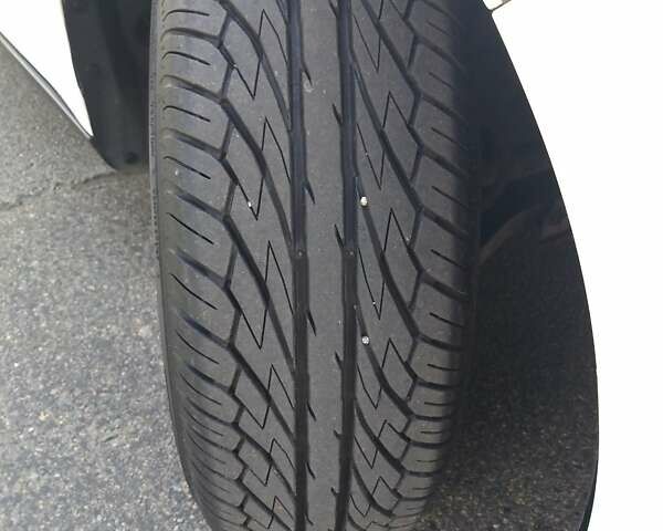 Білий Форд Фокус, об'ємом двигуна 1.59 л та пробігом 288 тис. км за 6001 $, фото 3 на Automoto.ua