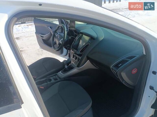 Белый Форд Фокус, объемом двигателя 1.56 л и пробегом 325 тыс. км за 5950 $, фото 17 на Automoto.ua