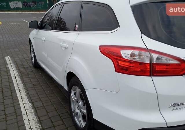 Белый Форд Фокус, объемом двигателя 2 л и пробегом 325 тыс. км за 6999 $, фото 14 на Automoto.ua
