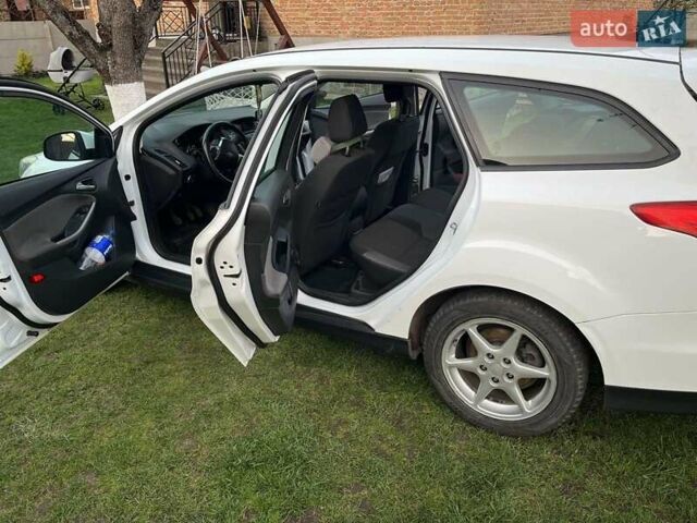 Білий Форд Фокус, об'ємом двигуна 1.56 л та пробігом 244 тис. км за 6300 $, фото 4 на Automoto.ua