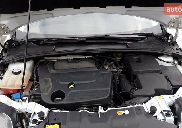 Белый Форд Фокус, объемом двигателя 2 л и пробегом 325 тыс. км за 6999 $, фото 10 на Automoto.ua