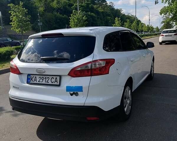 Білий Форд Фокус, об'ємом двигуна 1.59 л та пробігом 288 тис. км за 6001 $, фото 24 на Automoto.ua