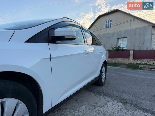 Білий Форд Фокус, об'ємом двигуна 1.6 л та пробігом 300 тис. км за 5599 $, фото 27 на Automoto.ua