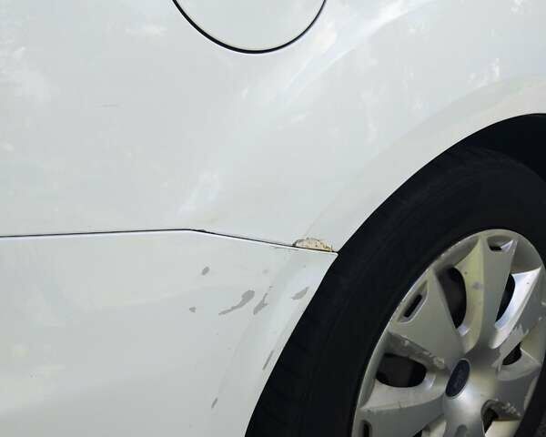 Білий Форд Фокус, об'ємом двигуна 1.59 л та пробігом 288 тис. км за 6001 $, фото 19 на Automoto.ua