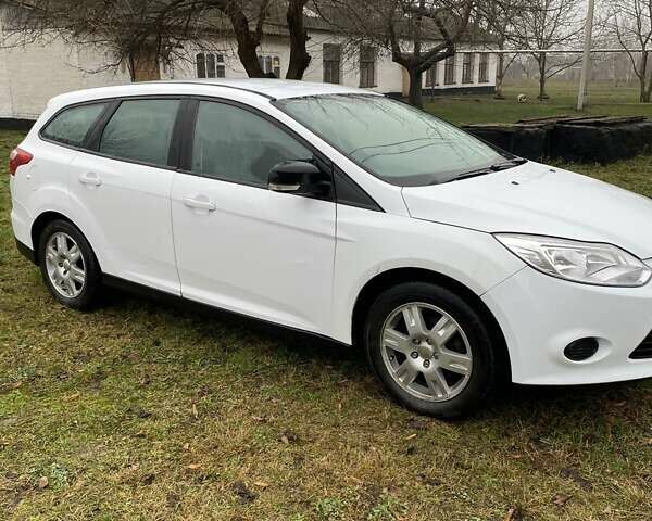Білий Форд Фокус, об'ємом двигуна 1.56 л та пробігом 260 тис. км за 5500 $, фото 1 на Automoto.ua