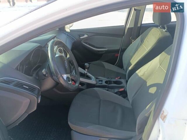 Белый Форд Фокус, объемом двигателя 1.56 л и пробегом 325 тыс. км за 5950 $, фото 11 на Automoto.ua