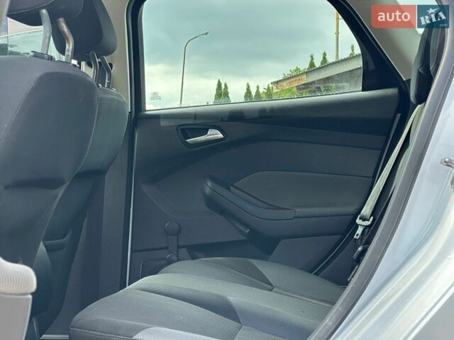 Білий Форд Фокус, об'ємом двигуна 1.56 л та пробігом 256 тис. км за 6150 $, фото 51 на Automoto.ua