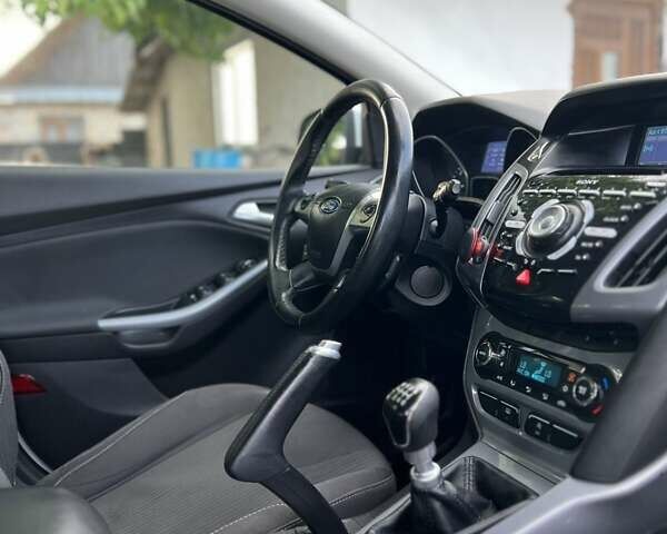 Білий Форд Фокус, об'ємом двигуна 1.56 л та пробігом 303 тис. км за 7500 $, фото 9 на Automoto.ua