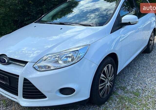 Білий Форд Фокус, об'ємом двигуна 1.56 л та пробігом 210 тис. км за 7900 $, фото 17 на Automoto.ua