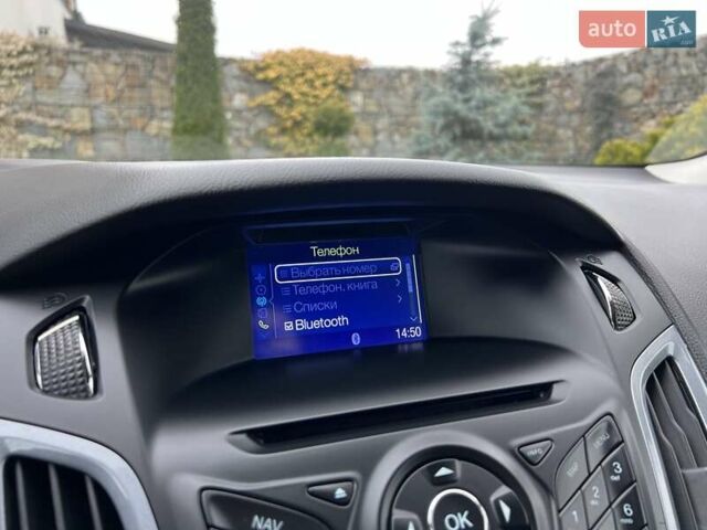 Білий Форд Фокус, об'ємом двигуна 1.6 л та пробігом 211 тис. км за 8750 $, фото 115 на Automoto.ua