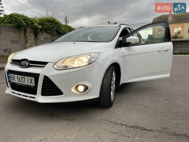 Білий Форд Фокус, об'ємом двигуна 1.56 л та пробігом 220 тис. км за 8499 $, фото 24 на Automoto.ua