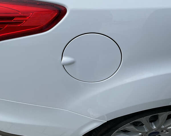 Білий Форд Фокус, об'ємом двигуна 2 л та пробігом 182 тис. км за 9800 $, фото 32 на Automoto.ua