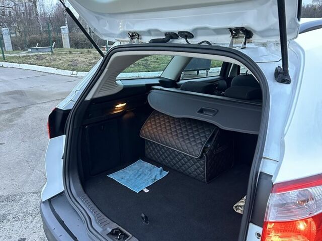 Белый Форд Фокус, объемом двигателя 2 л и пробегом 175 тыс. км за 7499 $, фото 7 на Automoto.ua