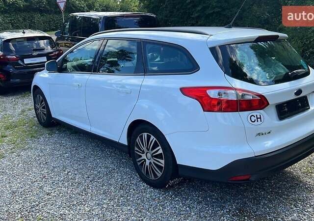 Білий Форд Фокус, об'ємом двигуна 1.56 л та пробігом 210 тис. км за 7900 $, фото 13 на Automoto.ua