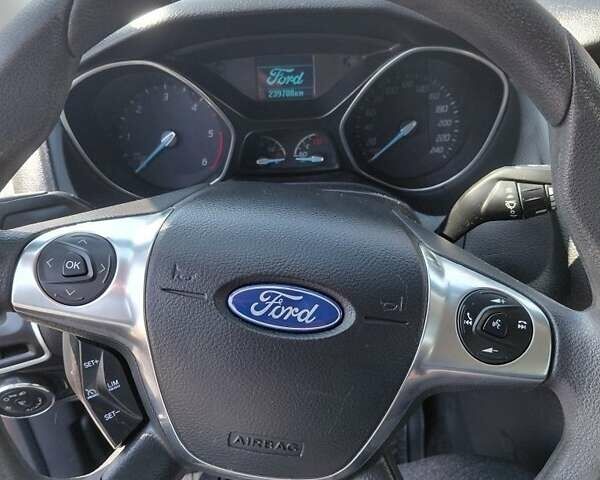 Білий Форд Фокус, об'ємом двигуна 1.6 л та пробігом 240 тис. км за 6950 $, фото 6 на Automoto.ua