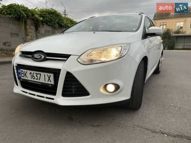 Білий Форд Фокус, об'ємом двигуна 1.56 л та пробігом 220 тис. км за 8499 $, фото 21 на Automoto.ua
