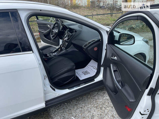 Білий Форд Фокус, об'ємом двигуна 2 л та пробігом 182 тис. км за 9800 $, фото 21 на Automoto.ua