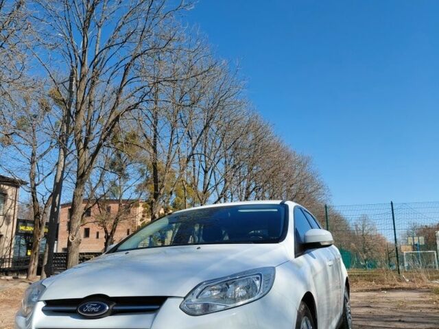 Белый Форд Фокус, объемом двигателя 1.6 л и пробегом 240 тыс. км за 6950 $, фото 1 на Automoto.ua