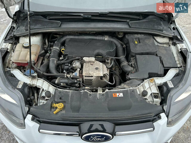 Белый Форд Фокус, объемом двигателя 1 л и пробегом 240 тыс. км за 6494 $, фото 16 на Automoto.ua
