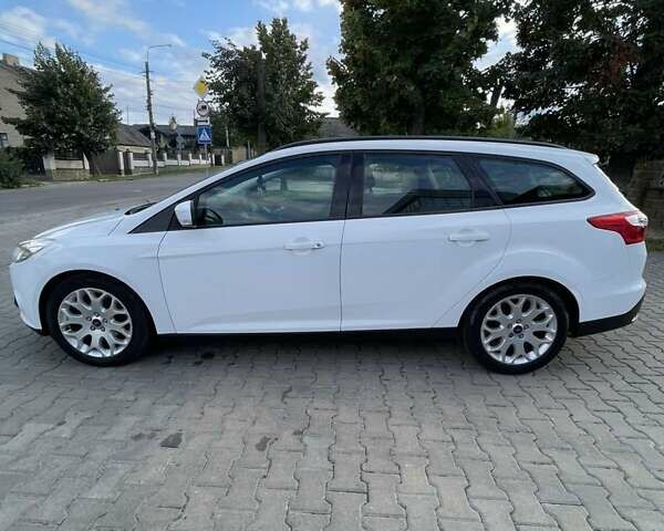 Білий Форд Фокус, об'ємом двигуна 1.56 л та пробігом 220 тис. км за 8499 $, фото 25 на Automoto.ua