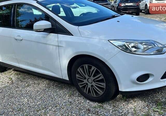 Білий Форд Фокус, об'ємом двигуна 1.56 л та пробігом 210 тис. км за 7900 $, фото 10 на Automoto.ua