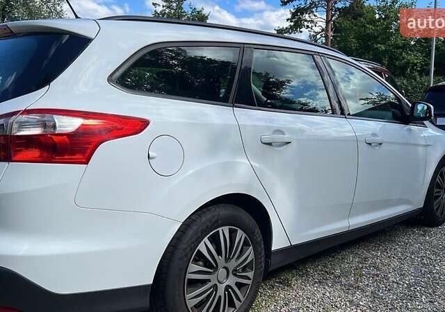 Білий Форд Фокус, об'ємом двигуна 1.56 л та пробігом 210 тис. км за 7900 $, фото 11 на Automoto.ua