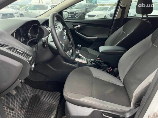 Білий Форд Фокус, об'ємом двигуна 1.6 л та пробігом 263 тис. км за 6790 $, фото 14 на Automoto.ua