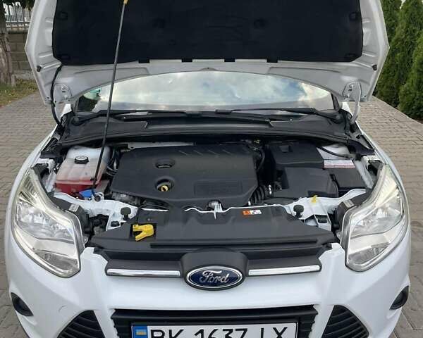 Білий Форд Фокус, об'ємом двигуна 1.56 л та пробігом 220 тис. км за 8499 $, фото 14 на Automoto.ua