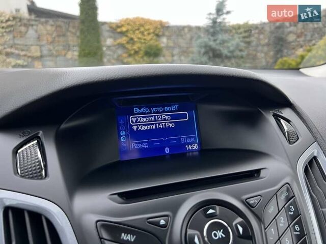 Білий Форд Фокус, об'ємом двигуна 1.6 л та пробігом 211 тис. км за 8750 $, фото 117 на Automoto.ua