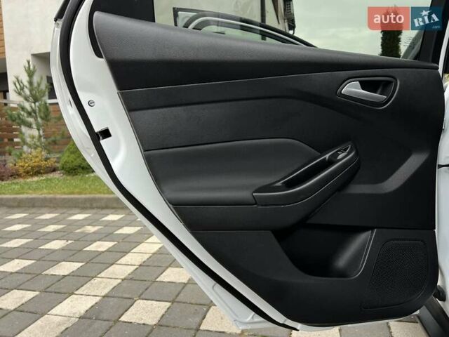 Білий Форд Фокус, об'ємом двигуна 1.6 л та пробігом 211 тис. км за 8750 $, фото 78 на Automoto.ua