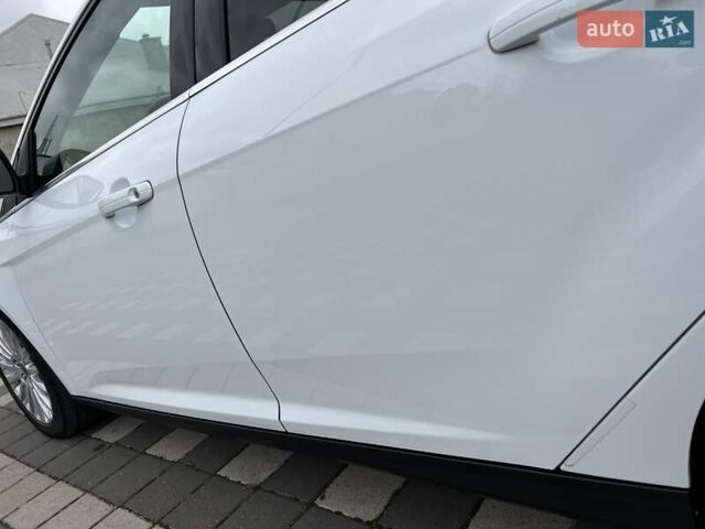 Білий Форд Фокус, об'ємом двигуна 1.6 л та пробігом 211 тис. км за 8750 $, фото 57 на Automoto.ua