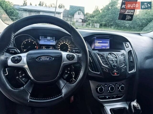 Білий Форд Фокус, об'ємом двигуна 1.56 л та пробігом 187 тис. км за 6999 $, фото 20 на Automoto.ua