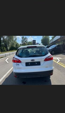 Білий Форд Фокус, об'ємом двигуна 1.56 л та пробігом 211 тис. км за 8000 $, фото 54 на Automoto.ua