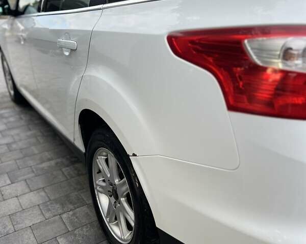 Білий Форд Фокус, об'ємом двигуна 1.56 л та пробігом 303 тис. км за 7500 $, фото 5 на Automoto.ua