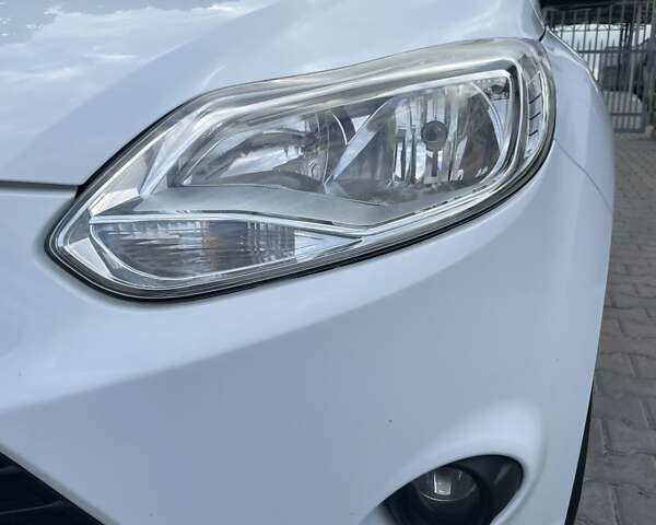 Білий Форд Фокус, об'ємом двигуна 1.56 л та пробігом 220 тис. км за 8499 $, фото 26 на Automoto.ua