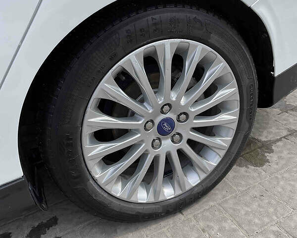 Білий Форд Фокус, об'ємом двигуна 2 л та пробігом 182 тис. км за 9800 $, фото 47 на Automoto.ua