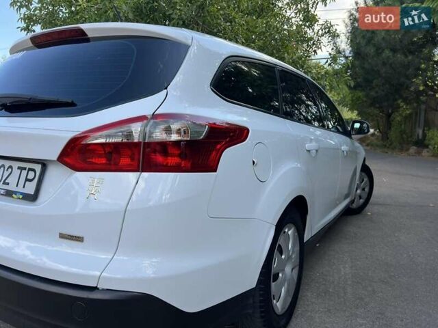 Білий Форд Фокус, об'ємом двигуна 1.56 л та пробігом 253 тис. км за 6300 $, фото 4 на Automoto.ua