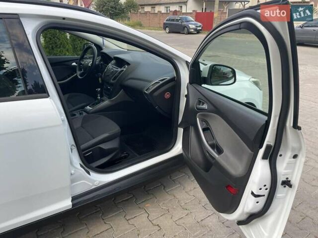 Білий Форд Фокус, об'ємом двигуна 1.56 л та пробігом 220 тис. км за 8499 $, фото 1 на Automoto.ua