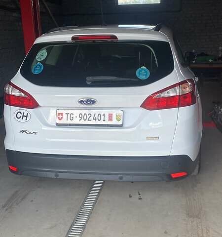 Білий Форд Фокус, об'ємом двигуна 1.56 л та пробігом 210 тис. км за 7900 $, фото 4 на Automoto.ua