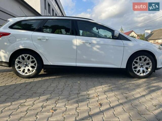 Білий Форд Фокус, об'ємом двигуна 1.56 л та пробігом 220 тис. км за 8499 $, фото 18 на Automoto.ua