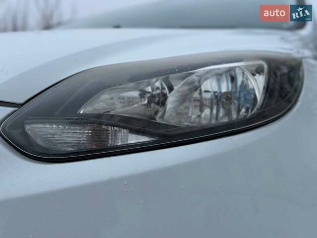 Белый Форд Фокус, объемом двигателя 1 л и пробегом 113 тыс. км за 7600 $, фото 30 на Automoto.ua