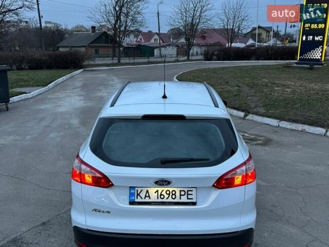 Белый Форд Фокус, объемом двигателя 2 л и пробегом 175 тыс. км за 7399 $, фото 4 на Automoto.ua