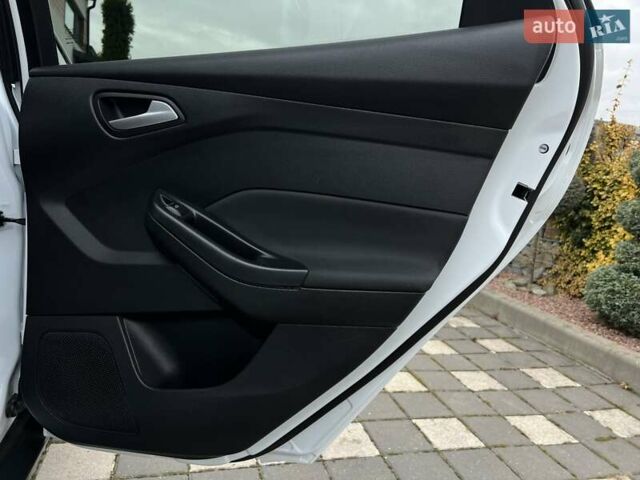 Білий Форд Фокус, об'ємом двигуна 1.6 л та пробігом 211 тис. км за 8750 $, фото 88 на Automoto.ua