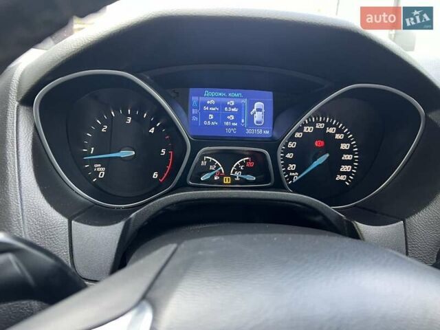 Білий Форд Фокус, об'ємом двигуна 1.56 л та пробігом 303 тис. км за 7500 $, фото 11 на Automoto.ua