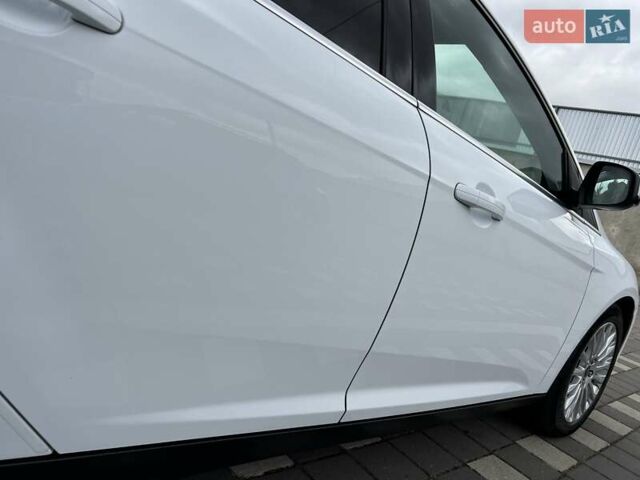 Білий Форд Фокус, об'ємом двигуна 1.6 л та пробігом 211 тис. км за 8750 $, фото 56 на Automoto.ua