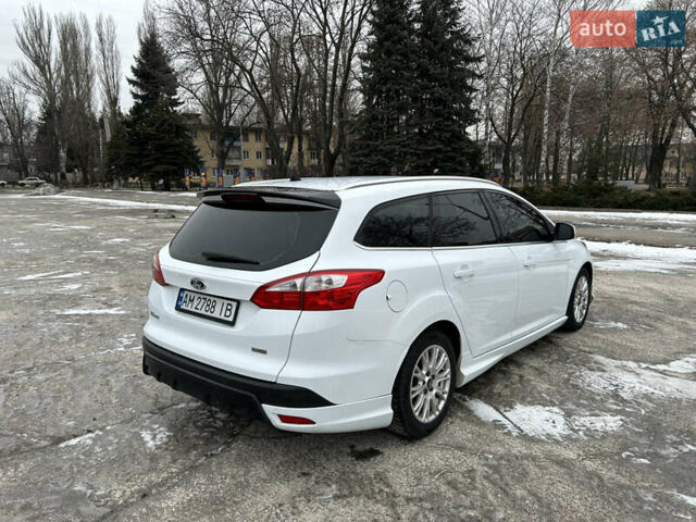 Белый Форд Фокус, объемом двигателя 1 л и пробегом 240 тыс. км за 6494 $, фото 2 на Automoto.ua