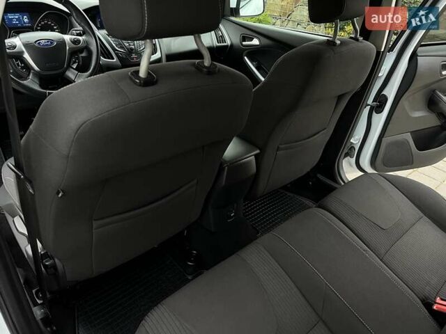 Білий Форд Фокус, об'ємом двигуна 1.6 л та пробігом 211 тис. км за 8750 $, фото 79 на Automoto.ua